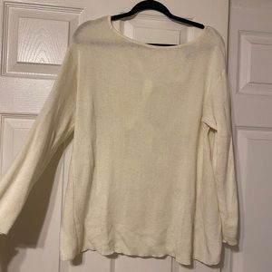 White sweater with open bow back detail